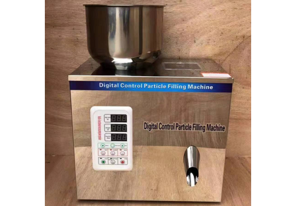 Máy định lượng gói hạt 100g