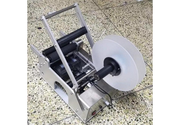 Máy dán nhãn tròng bán tụ động MT-50