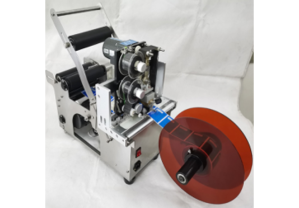 Máy dán nhãn chai tròn bán tự động MT-50C có in hạn sử dụng